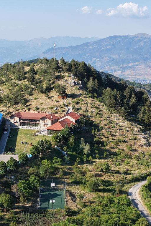 an aerial view of a house on a hill at Perla e Tomorrit EZ in Ujanik