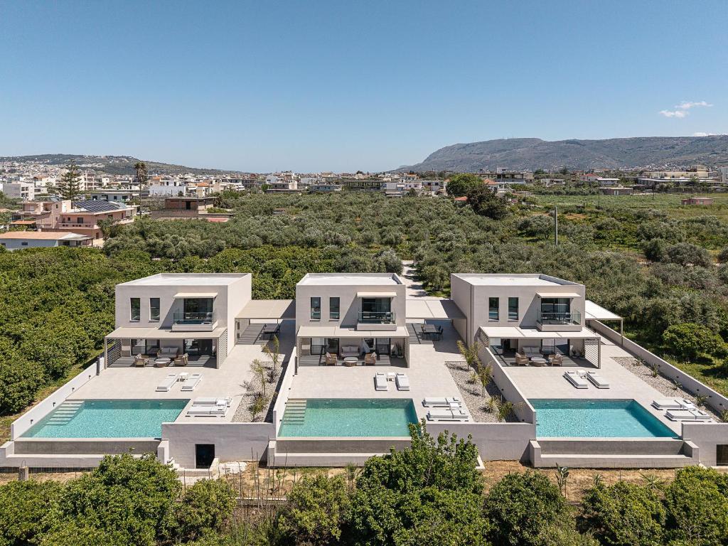 an aerial view of a house with two swimming pools at Hesperian Luxury Villas with Private Heated Pools in Chania