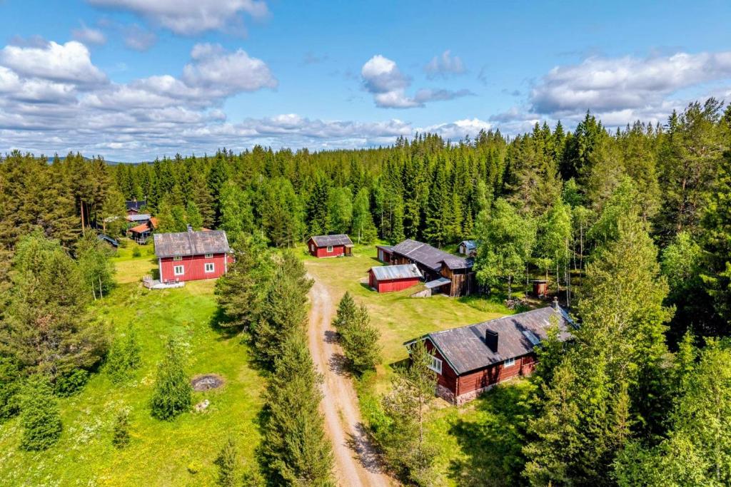 an aerial view of a village in a forest at Lilla Åsbo Gård in Husvallsgölen