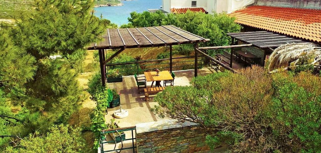 an overhead view of a house with a gazebo at Stone Kypri Apartment Andros in Kipri