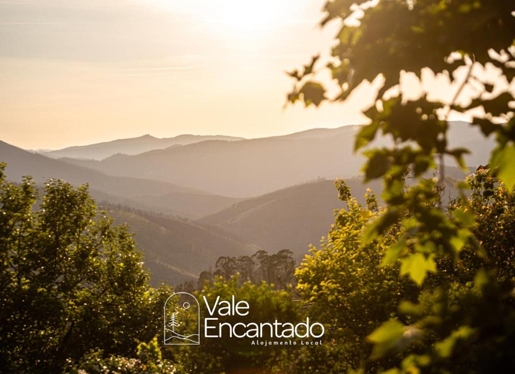 a view of a valley with mountains in the distance at Vale Encantado in Parada de Ester