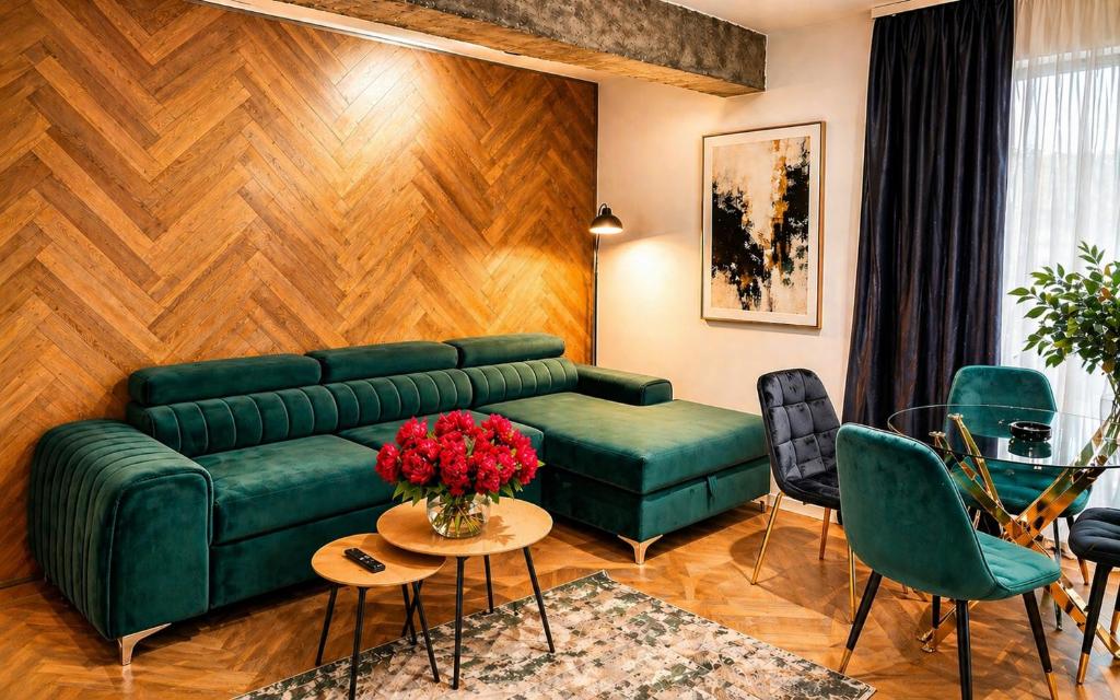 a living room with a green couch and chairs at Arena Park in Bucharest