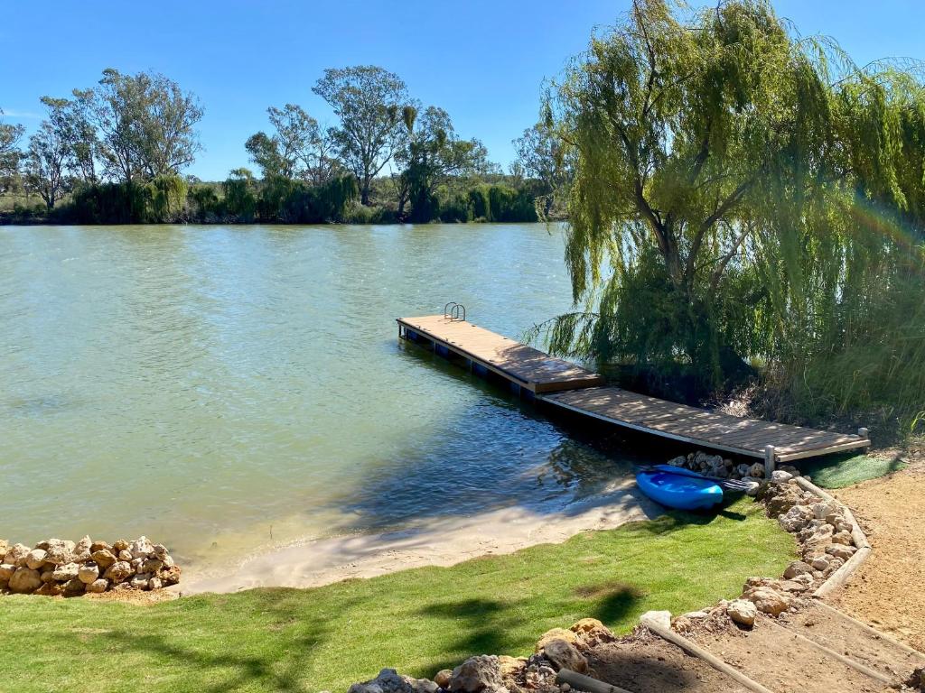 a wooden dock on the side of a lake at 'The Lookout' - Nildottie in Nildottie
