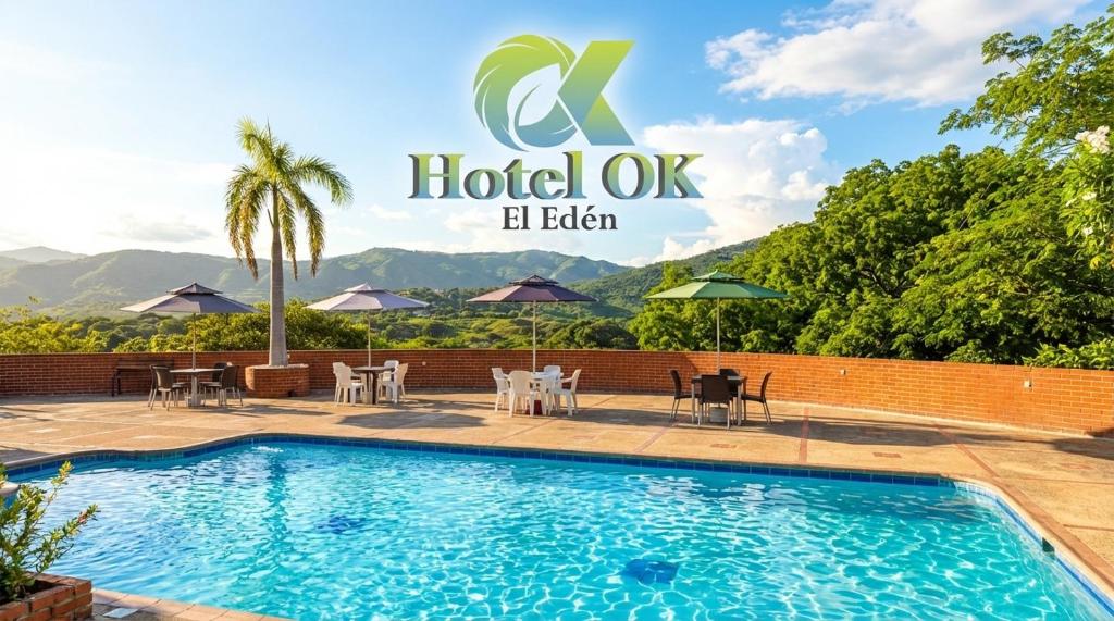 a villa with a swimming pool in a resort at Hotel OK El Edén in Tocaima
