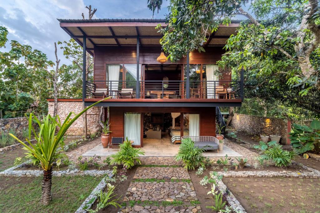 a house in the middle of a forest at Hidden Paradise West Sumbawa Yo Yos in Sekongkang Bawa