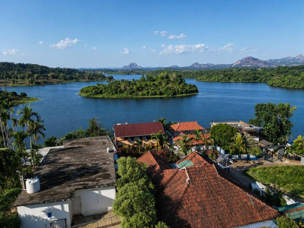 an aerial view of a river with islands at Karapuzha Water Scapes Wayanad in Wayanad