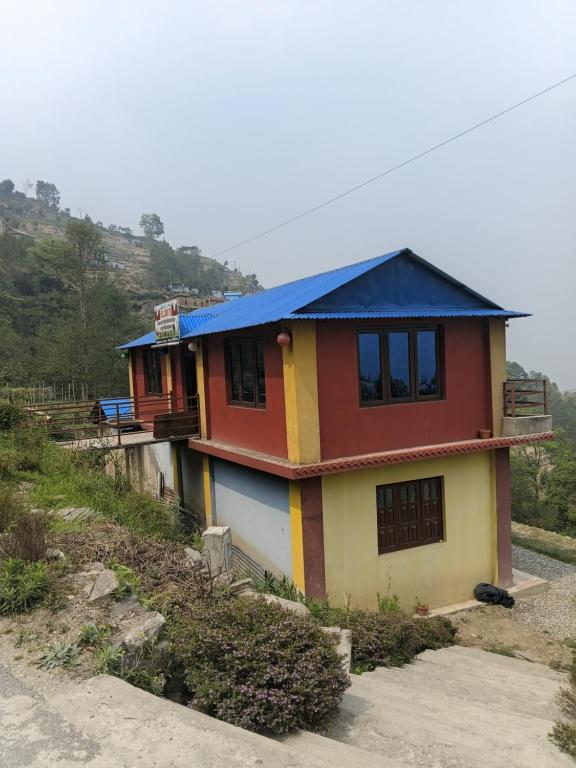 a house on top of a hill at Saura place Homestay in Nagarkot