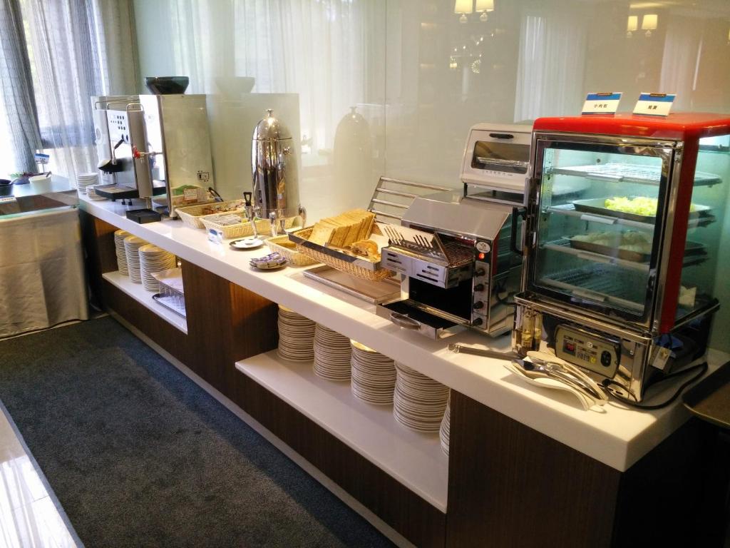 a counter in a restaurant with a food truck at Kaohsiung International Plaza in Kaohsiung