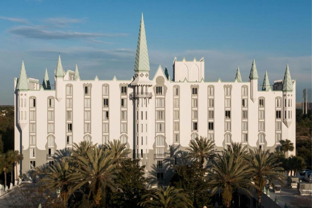 a white building with a spire on top of it at Castle Hotel, Autograph Collection in Orlando