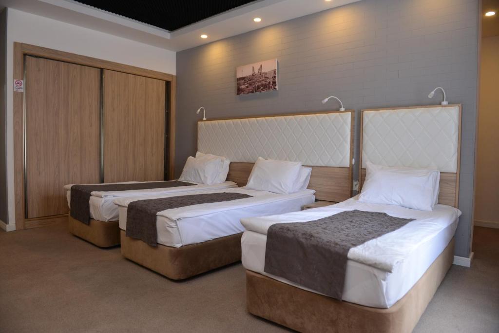 ZamZam-Madinah Halal Hotels Group - Camera Tripla