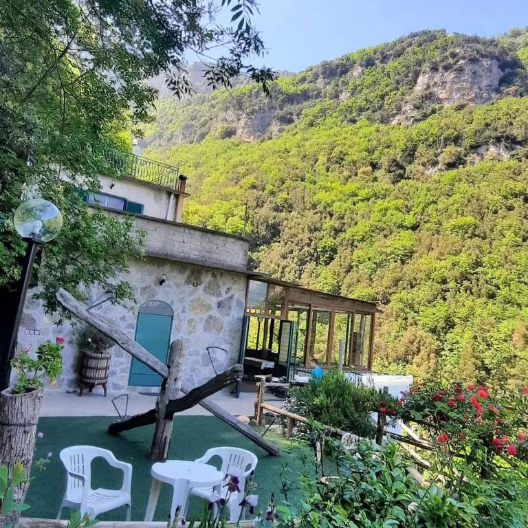 a house with a view of a mountain at Rifugio Capo D,acqua in Positano