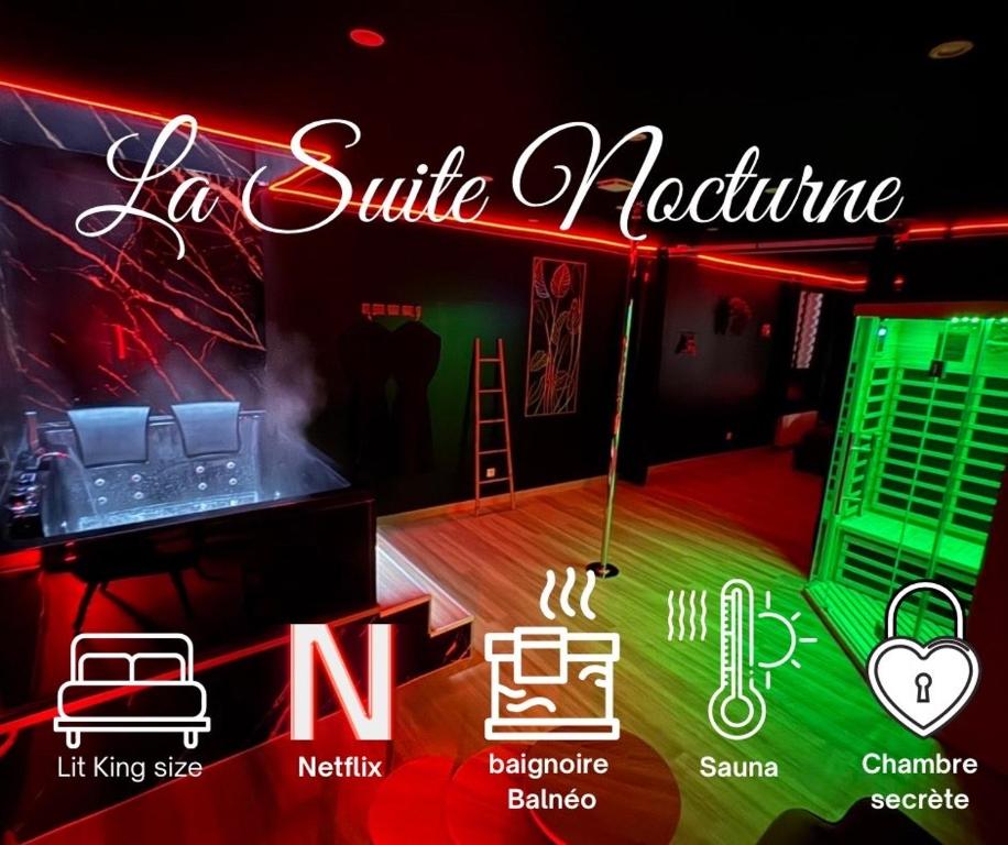 a neon sign that says la suite acupuncture in a room at La nuit nocturne in Bolbec