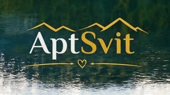 a sign for an art museum with a house at Apt 415 Svit in Jezersko