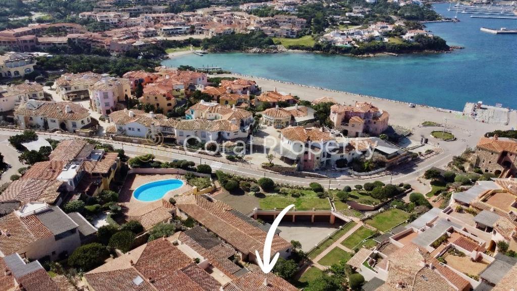 an aerial view of a city and the water at Yacht Terrace - Exclusive Waterfront View Porto Cervo Center - by Coral Property in Porto Cervo