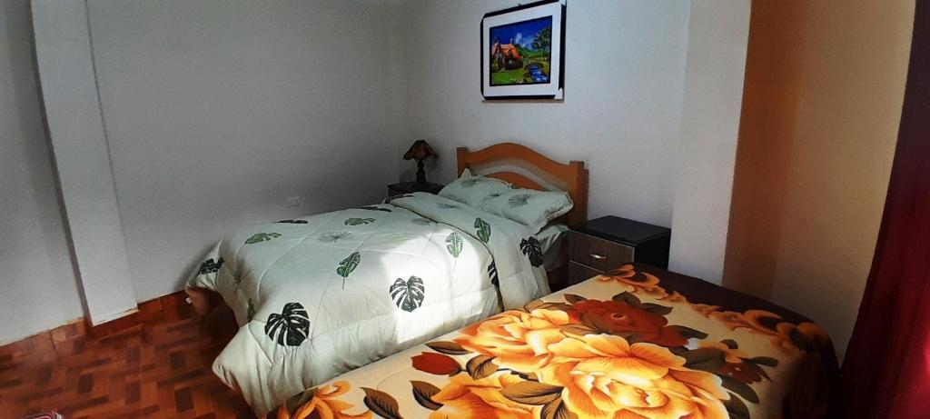Hostal Selena - Deluxe Doppelzimmer (2 Erwachsene + 1 Kind)