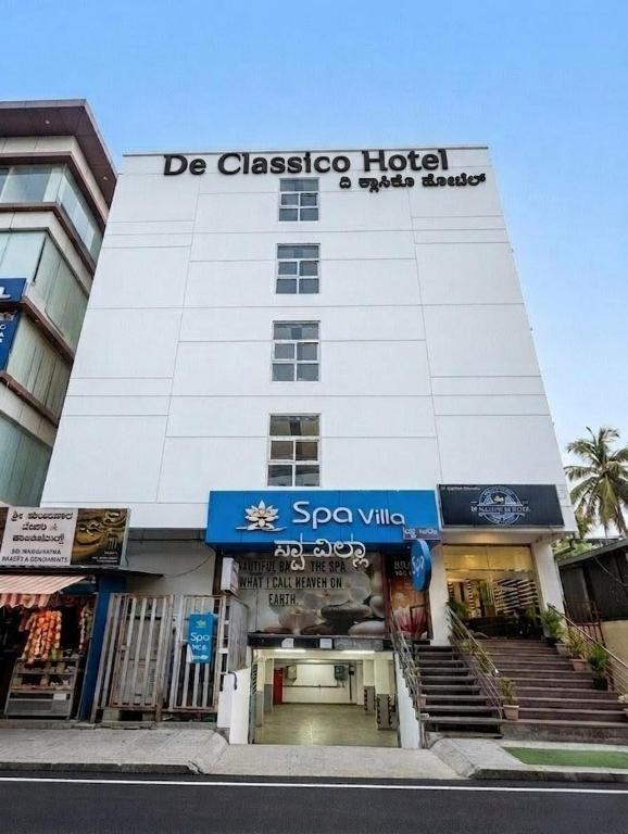 a building with a sign that reads de classico hotel at De Classico Hotel - HBR Layout in Bangalore