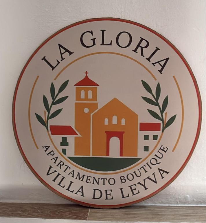 a sign for the na gloria karimina boutique villa lelez at Boutique La Gloria in Villa de Leyva