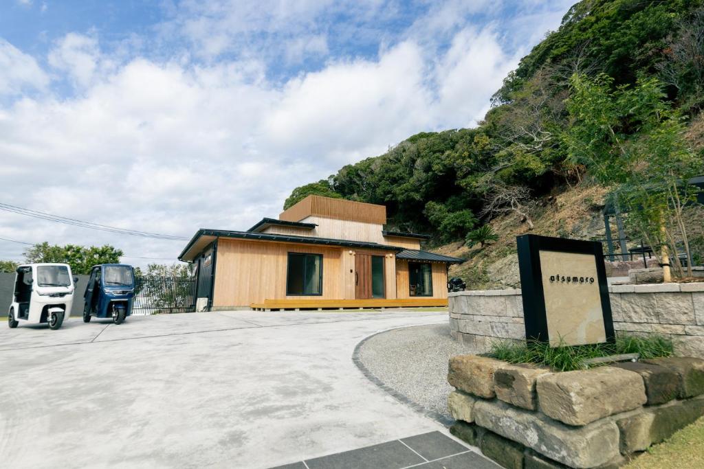 a house with a van parked in front of it at atsumaro in Minamiboso