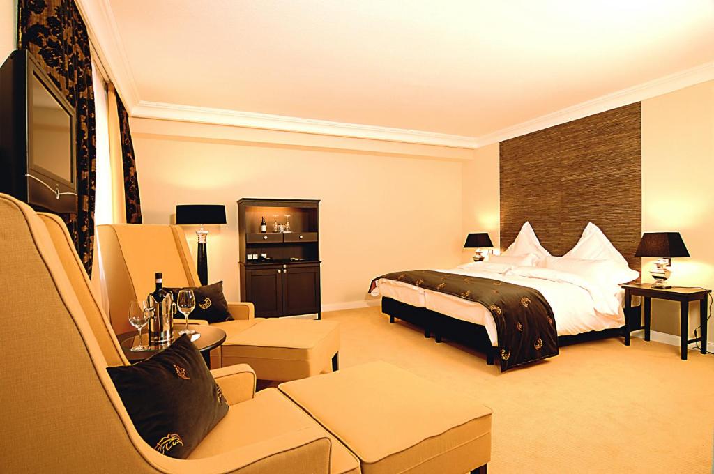 Postel nebo postele na pokoji v ubytování Hotel Business & More