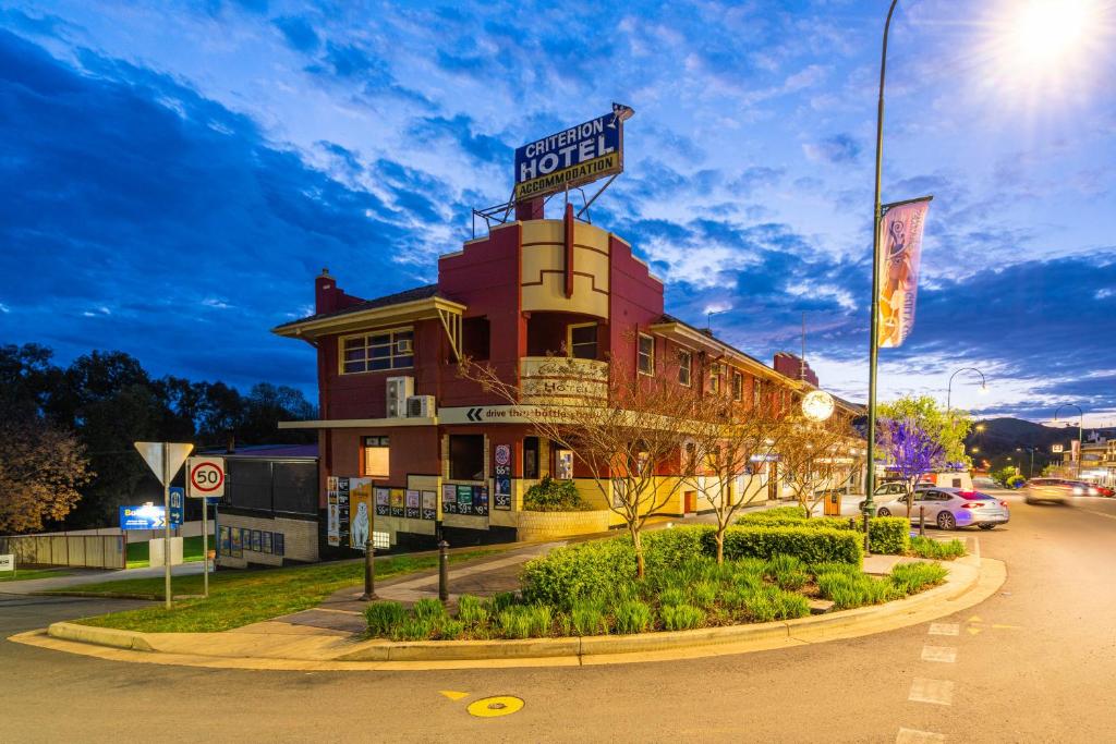 a hotel with a sign on top of a building at Criterion Hotel Gundagai in Gundagai