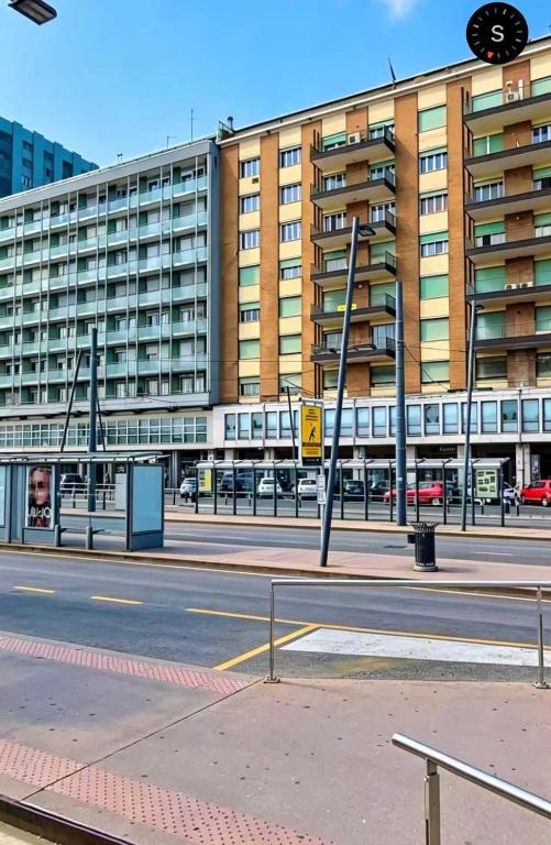 a large building in front of a street at ANMAN HHBB tourism & business rooms in Padova
