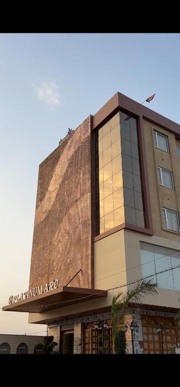 a building with a sign on the side of it at Platinum Arc in Jaipur