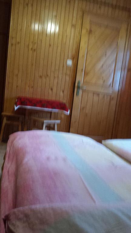 Posteľ alebo postele v izbe v ubytovaní Pokoje Zakopane