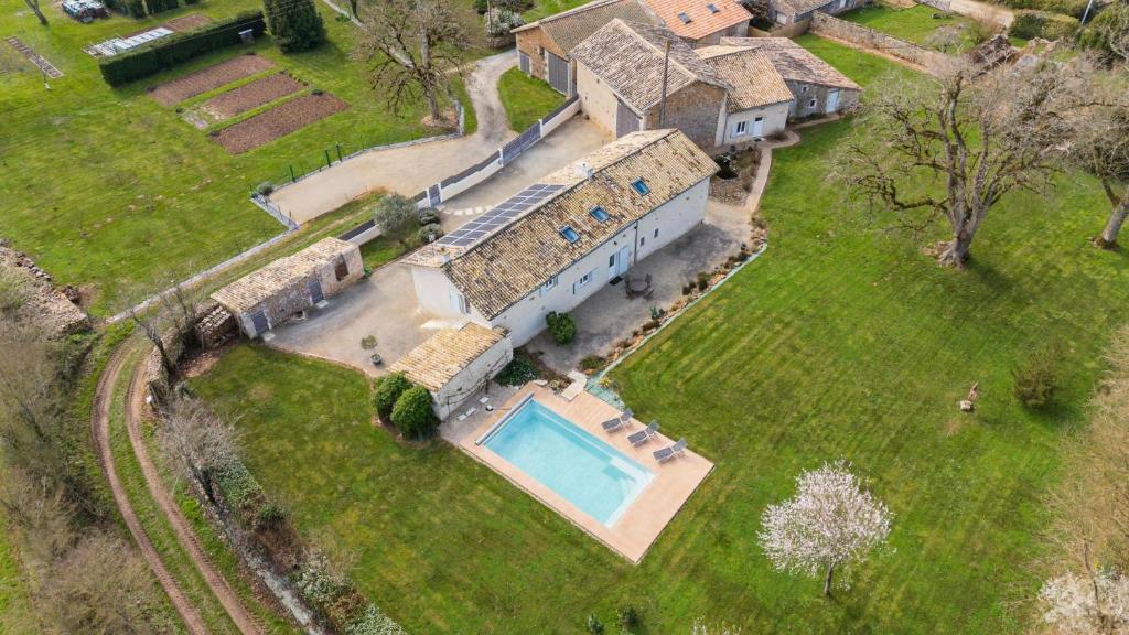 an aerial view of an estate with a swimming pool at Villa nest in Saint-Sauvant