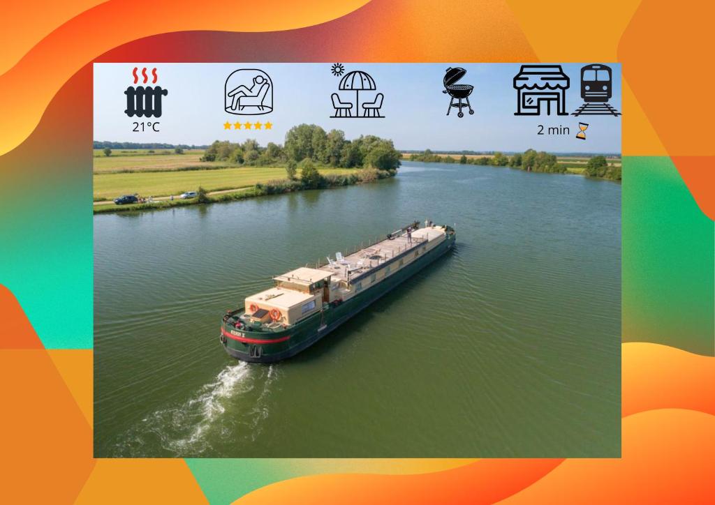 a boat traveling down a river with different logos at Le logement du marinier in Eckwersheim