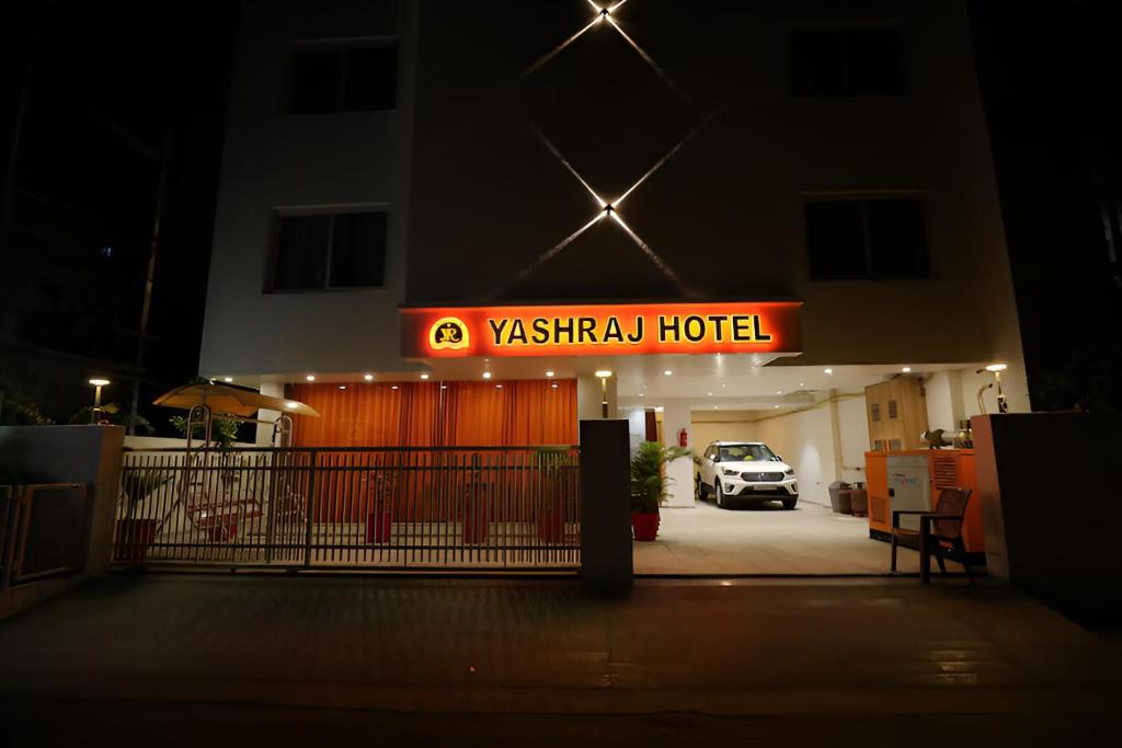a view of a yashka hotel at night at Nova Yashraj Hotel in Rajkot