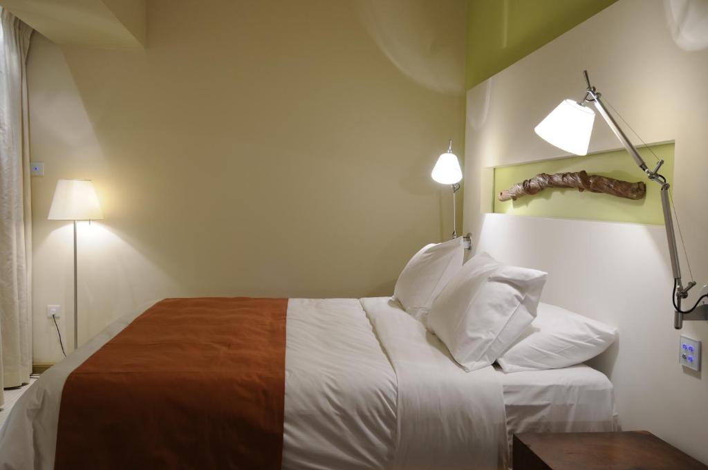 Postel nebo postele na pokoji v ubytování E-Hotel Larnaca Resort & Spa