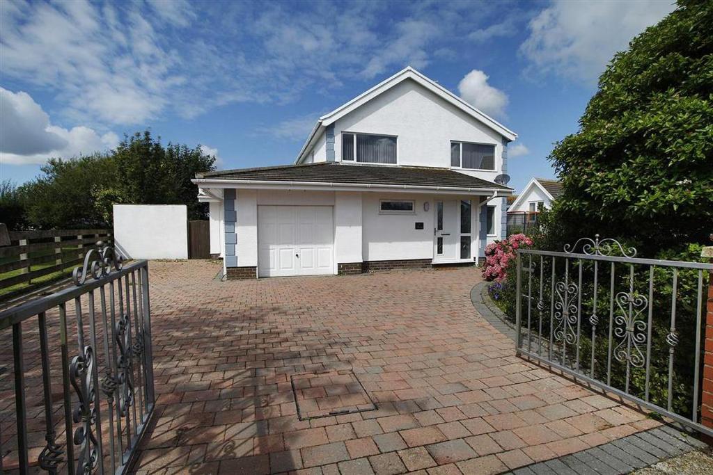 a white house with a gate and a brick driveway at 4 Bed in Swansea oc-hh682 in Parkmill