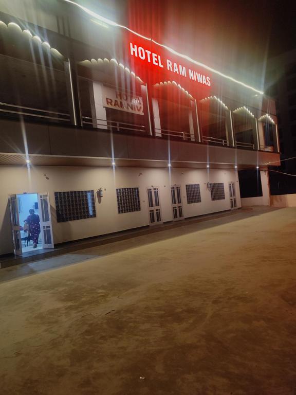 an empty parking lot in front of a hotel room at Hotel Ramnivas in Udaipur