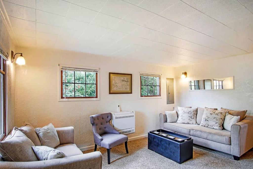 a living room with two couches and a chair at You Won't Be Crabby After Staying Here in Westport
