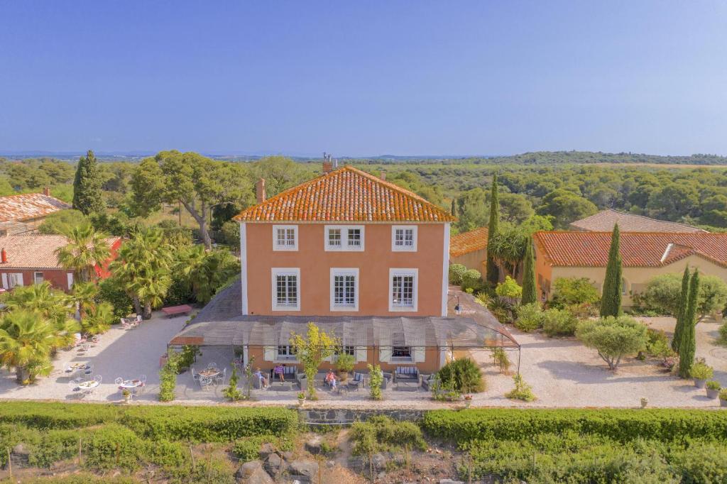 an aerial view of a house with an orange roof at Domaine de Roque Haute in Portiragnes