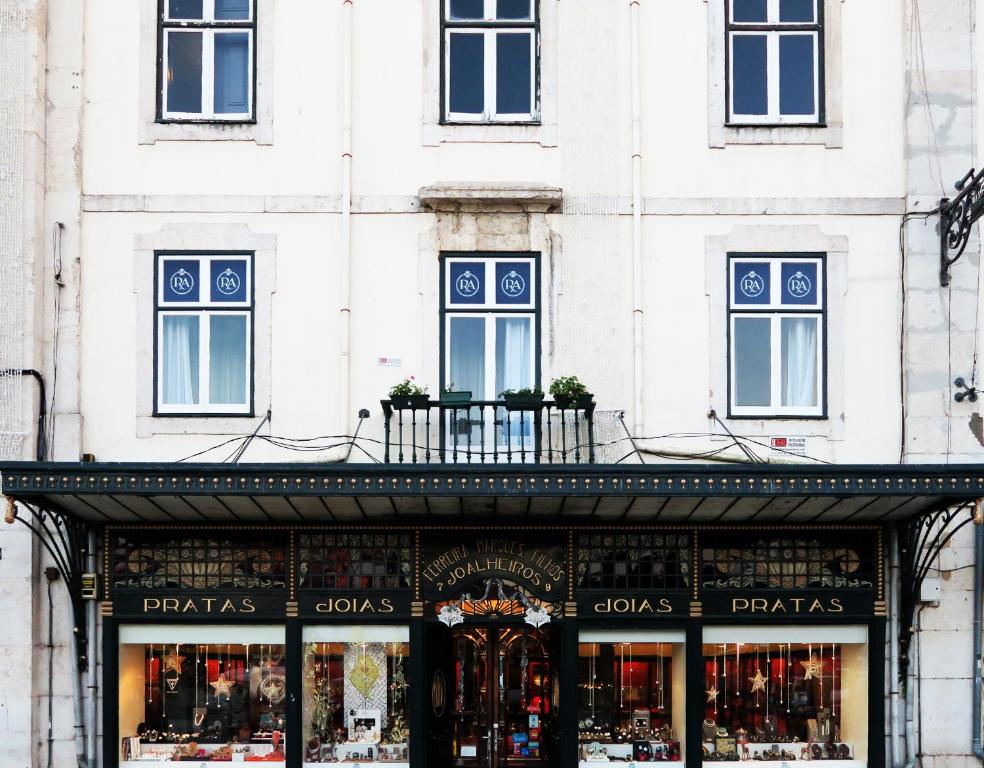 The facade or entrance of Rossio Apartments