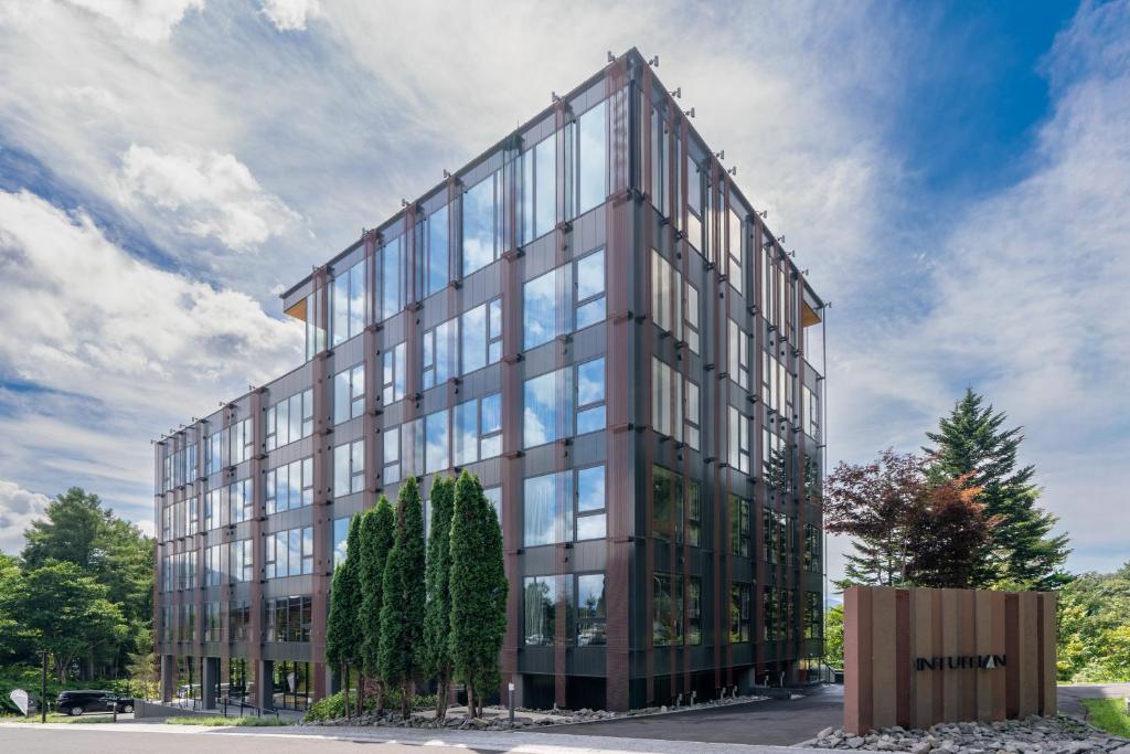 an office building with a lot of windows at Intuition in Kutchan