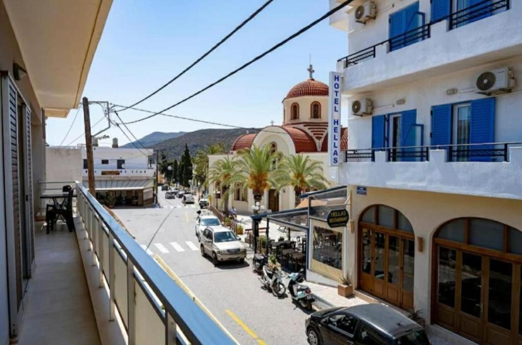 a view of a street from a balcony of a building at Mythos House in Palekastron