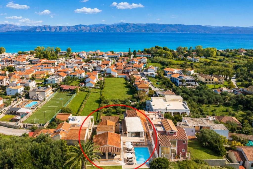 an aerial view of a city with a roller coaster at Kavos Panorama Hotel in Kavos