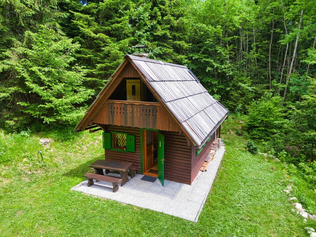 a small cabin in the middle of a forest at Princess Vogar in Bohinj