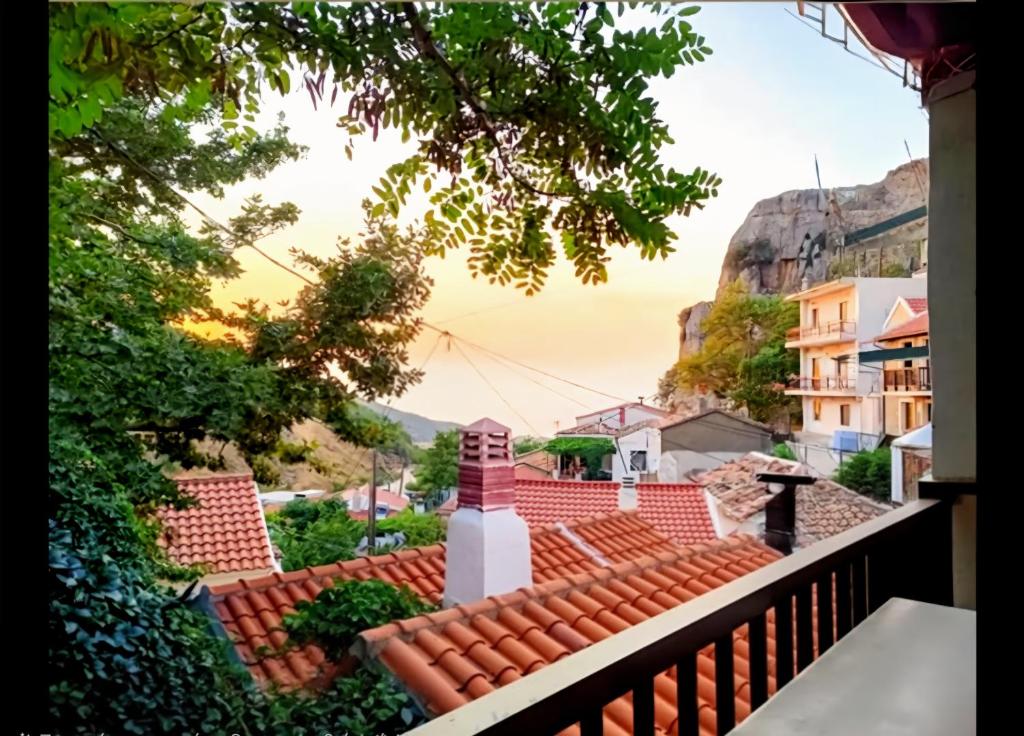 a view of a city from a balcony at Castle View in Samothraki