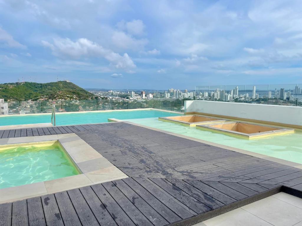 a swimming pool on the roof of a building at BlueMar Cartagena in Cartagena de Indias