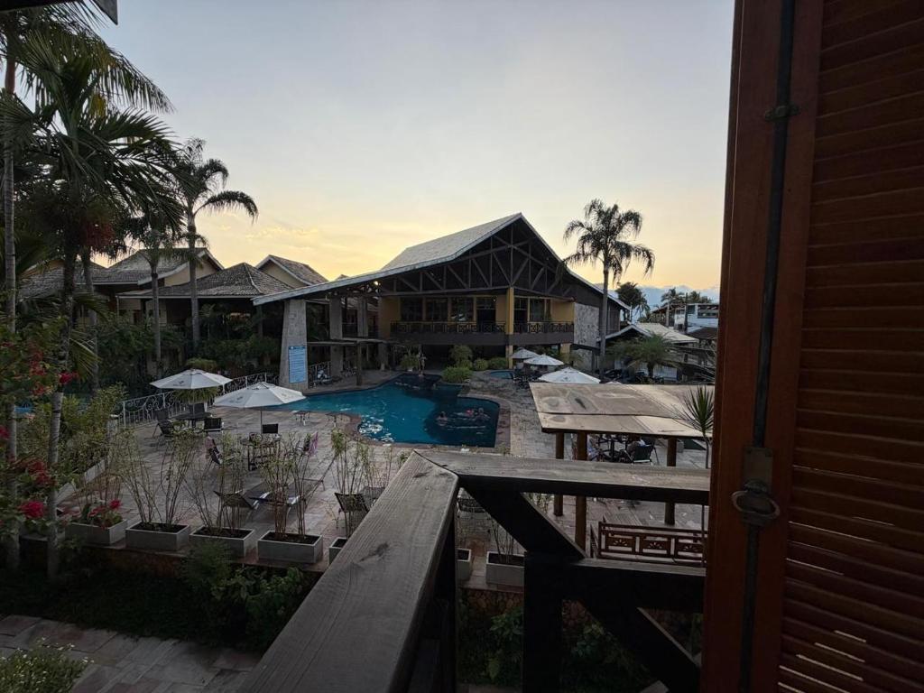 a view of a resort with a swimming pool at Ilha Flat Hotel 4201 in Ilhabela