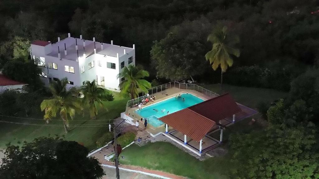 an aerial view of a house with a swimming pool at Casa Nueva en Condominio in Girardot