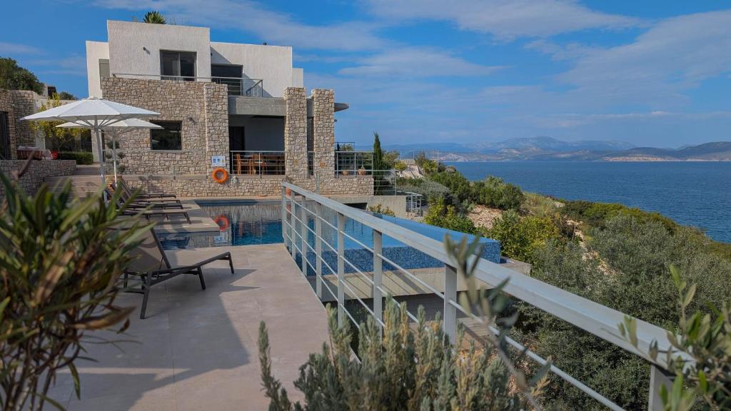 a house with a view of the water at Villa Levanda in Kiveri