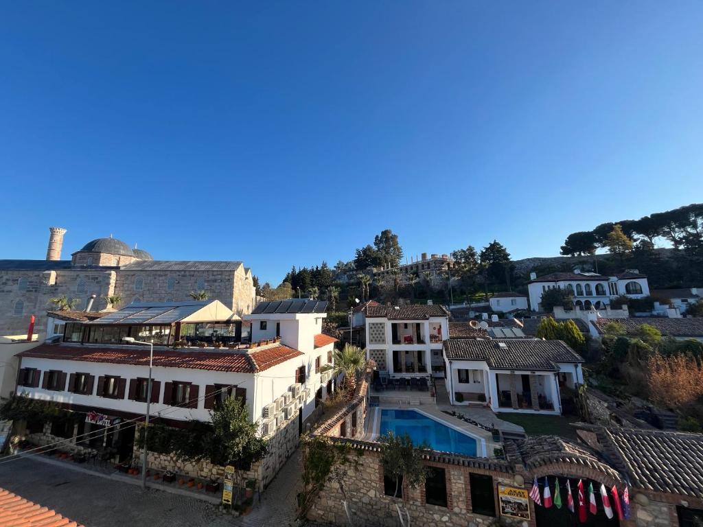 an aerial view of a town with buildings at Akay Hotel in Selçuk