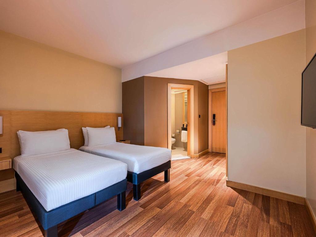 ALMSAKN ALOLA HOTEL COMPANY 