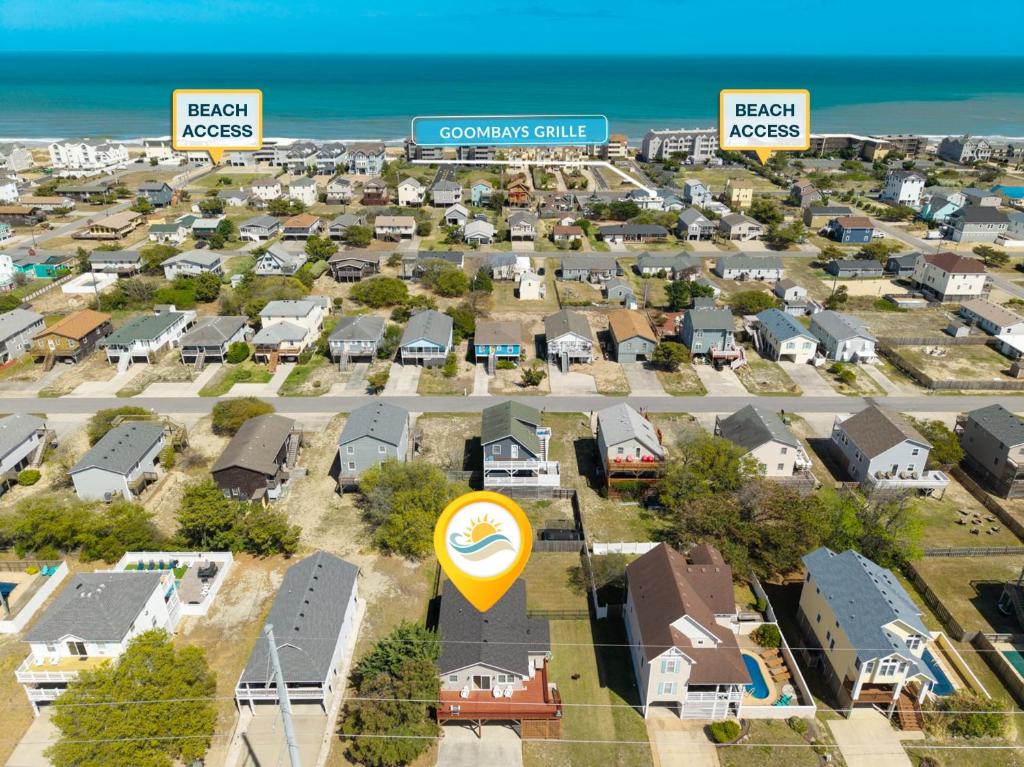 an aerial view of a suburb with houses at 5085 - Knapp's at the Beach in Kill Devil Hills