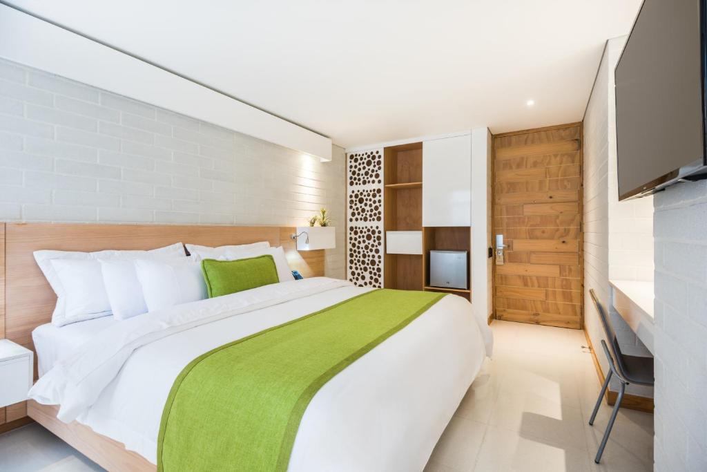 Postel nebo postele na pokoji v ubytování Terra Biohotel