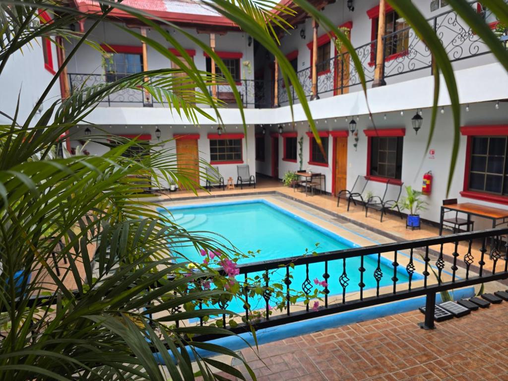 a pool in the courtyard of a building at Hotel Casona Macondo, Granada, Nicaragua in Granada